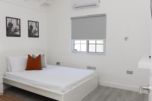 Ένα ή περισσότερα κρεβάτια σε δωμάτιο στο Eshae Living - 1 BR with breakfast & private pool