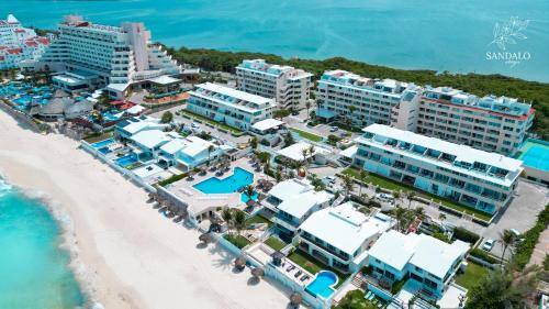 an aerial view of a resort on the beach at Incredible Suite Cancun - BEACH CONDO - 6PX in Cancún