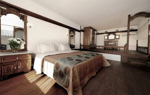 Кровать или кровати в номере Apolis Beachscape Hotel