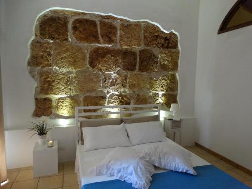 Postel nebo postele na pokoji v ubytování L'Arenaria Casa Vacanze