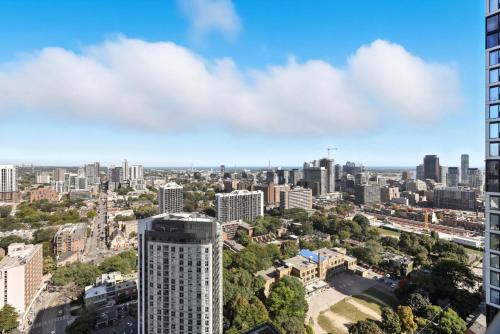 an aerial view of a city with tall buildings at Bright 2BR Downtown Toronto Condo in Toronto