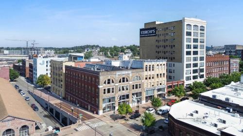 an aerial view of a city with tall buildings at Soaring Designer Ceiling Condo near Market Square in Knoxville