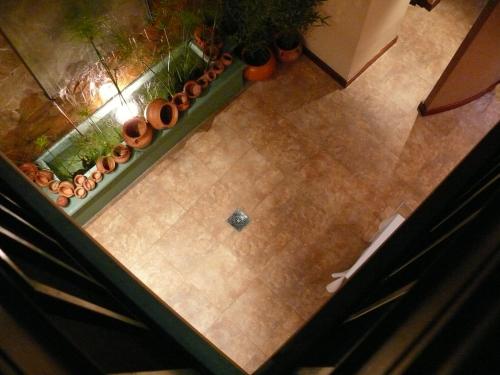 an overhead view of a floor with pots and plants at Gregorio I Hotel Boutique in San Salvador de Jujuy