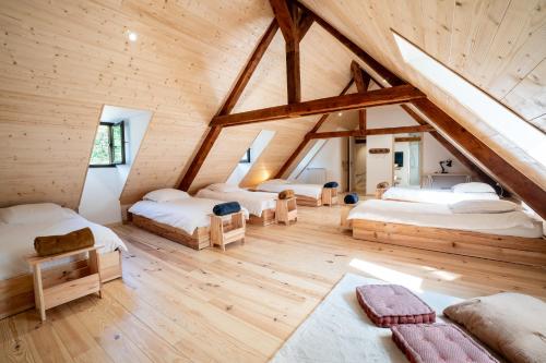 Llit o llits en una habitació de L'Ostal de Beaudéan