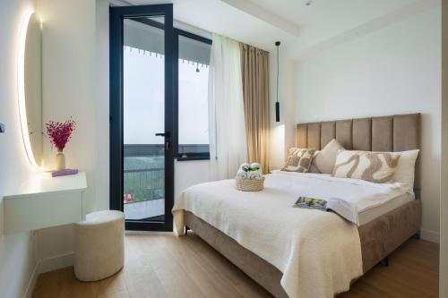 Ένα ή περισσότερα κρεβάτια σε δωμάτιο στο hotelise l Pastel Apartment