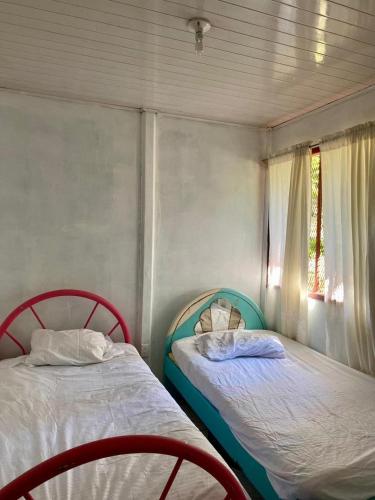 Postel nebo postele na pokoji v ubytování La Casa de Tita