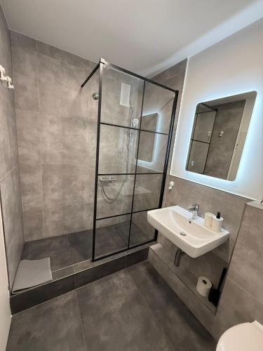 Ένα μπάνιο στο H&H Apartments Ratingen