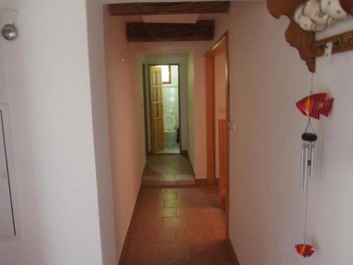 a hallway with a hallway leading to a room at Kopaniny in Kopaniny