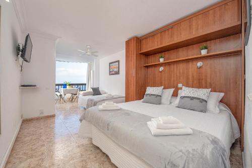 a bedroom with two beds in a room at Loft Atlántico Patalavaca in Patalavaca