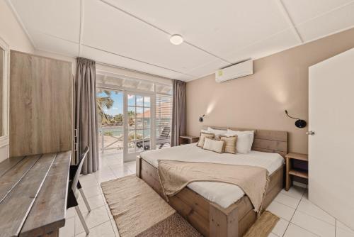 Postel nebo postele na pokoji v ubytování Bon Bini Resort Curacao