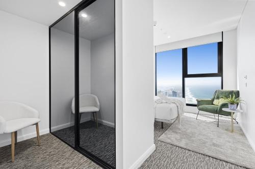 a mirror in a room with a view at Oceans Suites - Q Stay in Gold Coast