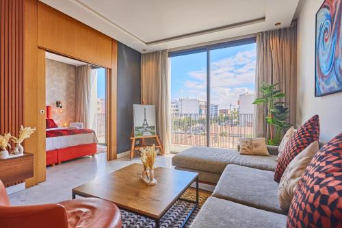 Postel nebo postele na pokoji v ubytování Le loft du soleil B living