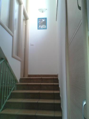 a staircase in a building with a stair case at B&B Il Nido dell'Aquila in San Donato di Ninea