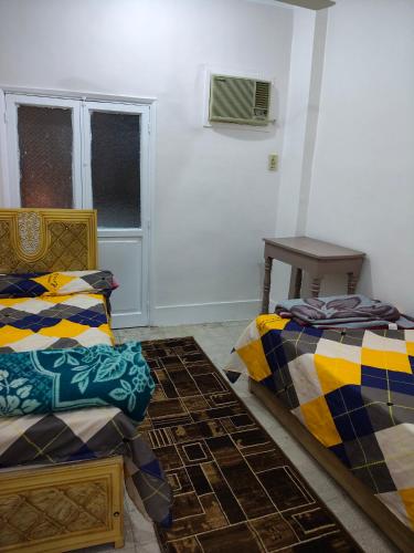 Χώρος καθιστικού στο Atlas Aswan Apartment Near Nile Corniche and Old Tourist Market شقة أطلس أسوان بجوار كورنيش النيل والسوق السياحي القديم