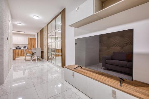 Posezení v ubytování Cosy Suite Saint Julians