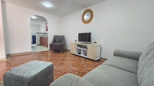 Μια τηλεόραση ή/και κέντρο ψυχαγωγίας στο Charming family home in San Gil!