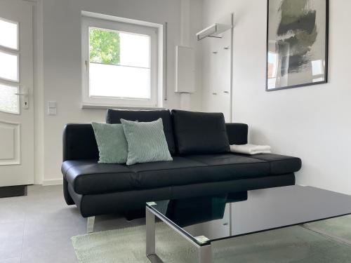 Ein Sitzbereich in der Unterkunft Heide Apartment Heimat