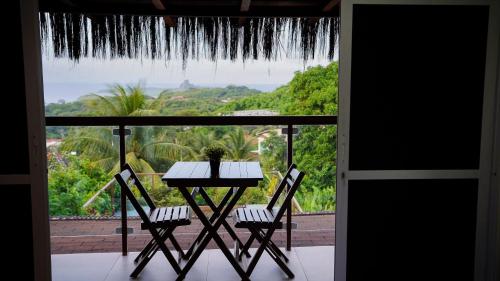 Un balcón o terraza de Flat Superior com Vista Panorâmica e Piscina Compartilhada
