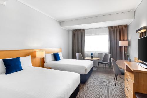 Ένα ή περισσότερα κρεβάτια σε δωμάτιο στο Novotel Perth Langley