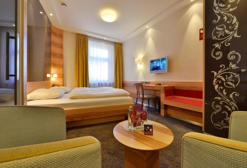 Cama o camas de una habitación en Hotel Torbräu