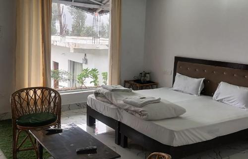 Ένα ή περισσότερα κρεβάτια σε δωμάτιο στο PJ Duplex- A Luxury Stay in Kedarnath