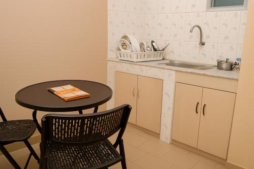 Köök või kööginurk majutusasutuses Résidence La Paix Yamoussoukro, L'Oasis