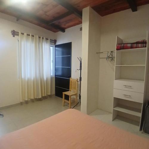 En eller flere senge i et værelse på The Magic