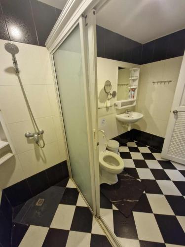 a bathroom with a toilet and a sink at Superb 3 Bed Pool Villa in Ban Saiyuan (1)