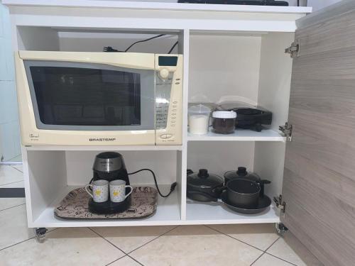 Køkken eller tekøkken på Studio amplo e aconchegante no bairro aterrado