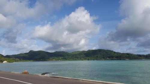 a view of the ocean from the side of a road at Villa Kayola - Self Catering in Mahe