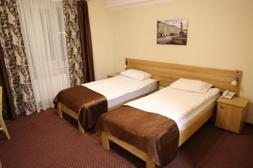 Postel nebo postele na pokoji v ubytování Argo Premium