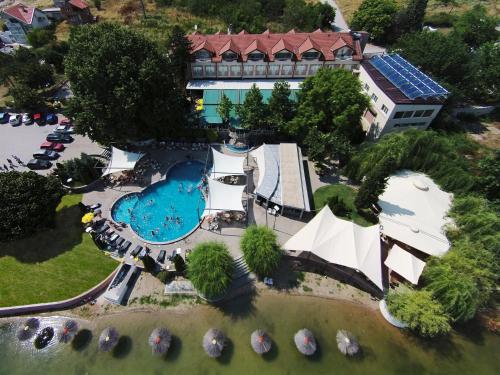 an overhead view of a resort with a swimming pool at Romantique Veles Hotel in Veles