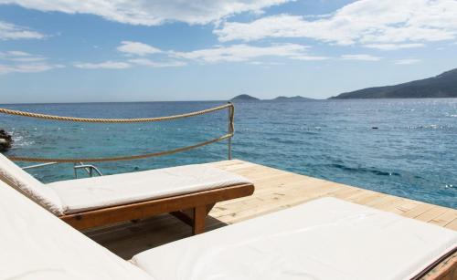 a view of the ocean from the deck of a boat at Soothe Hotel in Kalkan