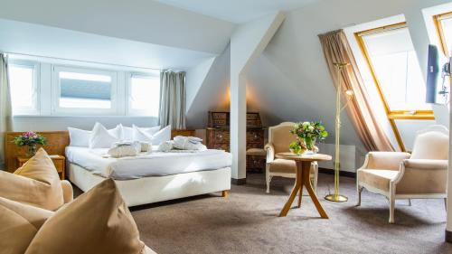 Posezení v ubytování Hotel Holsteiner Hof - Timmendorfer Strand