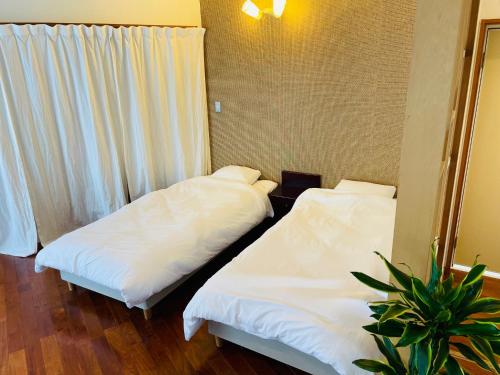 Katil atau katil-katil dalam bilik di ＡＴＴＡ ＨＯＴＥＬ ＫＡＭＡＫＵＲＡ - Vacation STAY 87051v