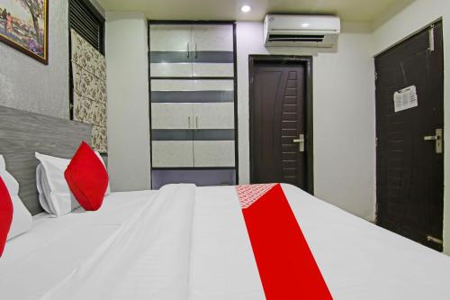 Ένα ή περισσότερα κρεβάτια σε δωμάτιο στο Hotel O Yuvraj