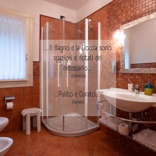 a bathroom with a shower and a sink at Albergo Corte di Emma in Arzignano