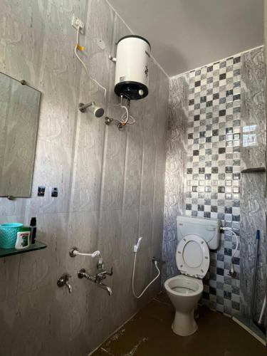 Koupelna v ubytování Madhubani homestay Mysore