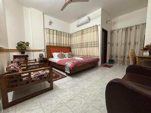 Postel nebo postele na pokoji v ubytování Hotel Farmis Garden