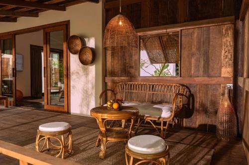 Posezení v ubytování Green Bay Phu Quoc Resort & Spa