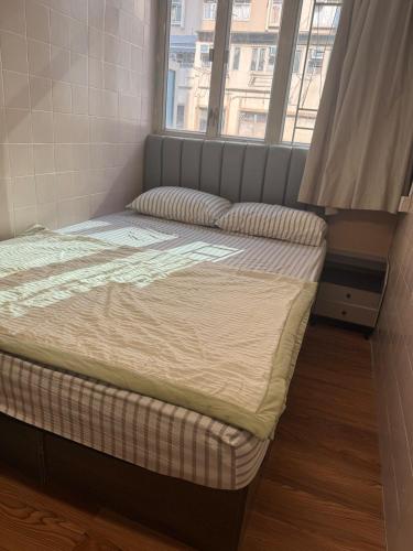 Postel nebo postele na pokoji v ubytování 旅居1号