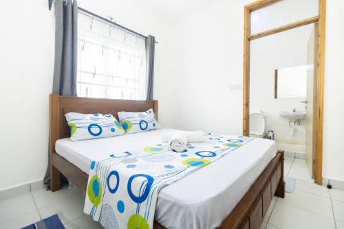 Ένα ή περισσότερα κρεβάτια σε δωμάτιο στο Princevy Homes