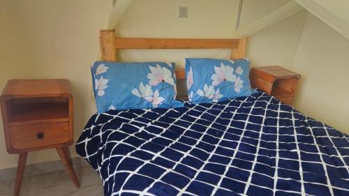 Postel nebo postele na pokoji v ubytování Cosy modern one bedroom apartment