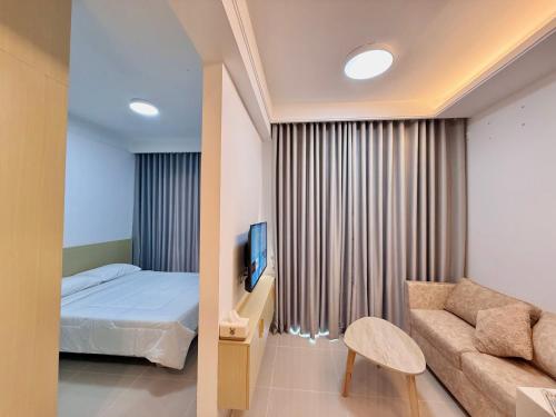 Postel nebo postele na pokoji v ubytování R Residences