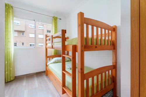 Ένα ή περισσότερα κρεβάτια σε δωμάτιο στο Encantador apartamento en la playa