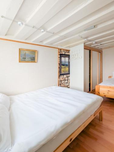 Voodi või voodid majutusasutuse Appart cozy vue montagne, jardin 3 min de Villars toas