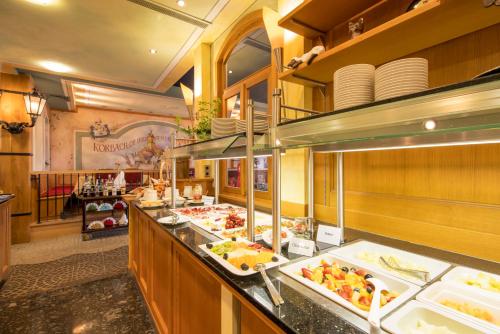 a buffet line with many different types of food at Hotel Touric in Korbach