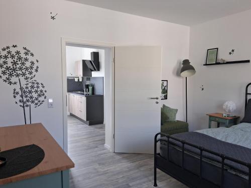 Η κουζίνα ή μικρή κουζίνα στο Ferienhaus Wasserkunst am Butterberg - Bohlenmoor