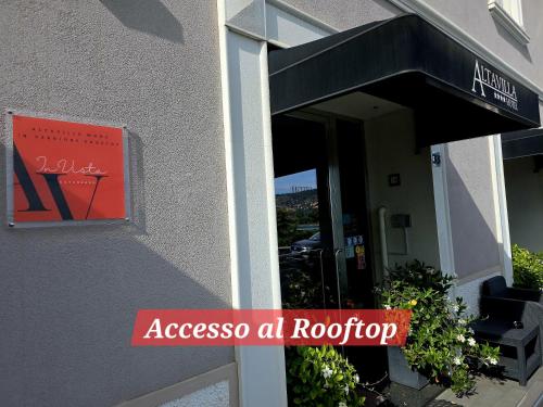 a sign on the side of a building at Altavilla Boutique Hotel in Catanzaro
