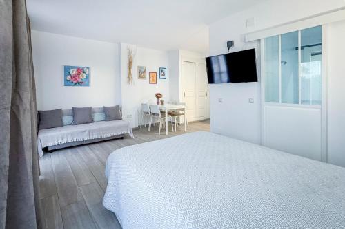 En eller flere senge i et værelse på Romana Playa Marbella